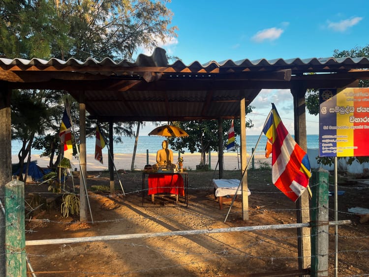 Authorities try to demolish illegal Trinco cafe, monks livid at police upholding the law